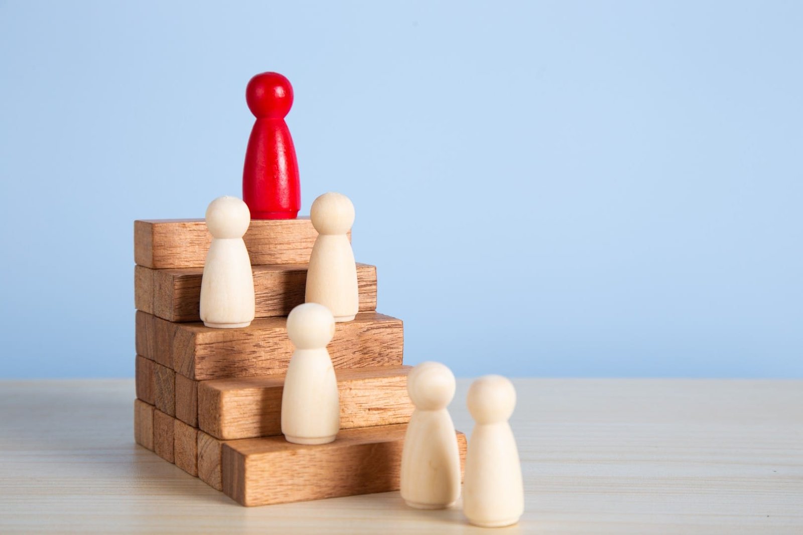 wooden-people-figures-on-top-of-wooden-blocks-car-2025-01-07-22-12-37-utc